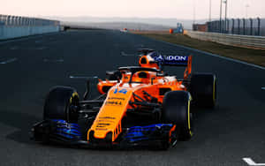 Max Verstappen Driving His Mclaren F1 Car Wallpaper