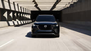 Mazda C X3 Driving Through Tunnel Wallpaper