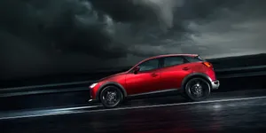 Mazda C X3 Red Driving Rainy Weather Wallpaper