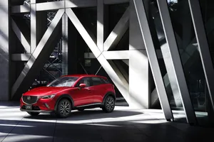 Mazda C X3 Red Urban Backdrop Wallpaper