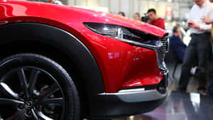 Mazda Cx-30 Sleek Design On Road Wallpaper