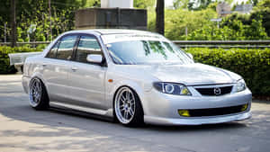 Mazda Protege On The Road Wallpaper