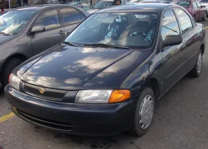 Mazda Protege Silver Sedan Wallpaper