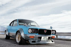 Mazda Rx-3 Showcasing Its Elegance And Design Wallpaper