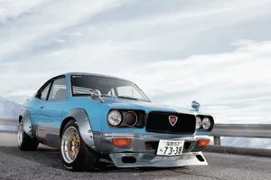 Mazda Rx-3 Showcasing Its Elegance And Design Wallpaper