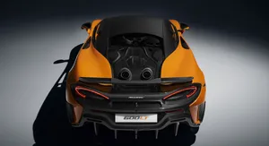 Mclaren 600lt In Action On The Road Wallpaper