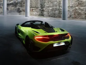 Mclaren 765lt Speeding Through The Streets Wallpaper