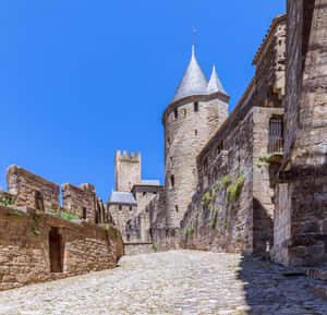 Medieval Citadel Street In Carcassonne Wallpaper