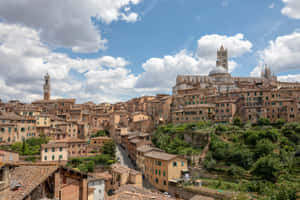 Medieval Houses And Buildings In Siena Wallpaper