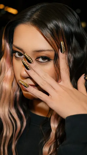 Megan Katseye Bold Nail Art Wallpaper