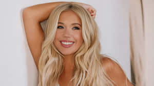 Megan Moroney Smiling Blonde Portrait Wallpaper