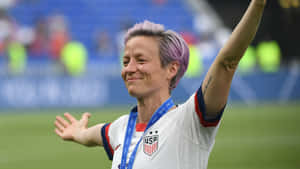 Megan Rapinoe In Action Wallpaper