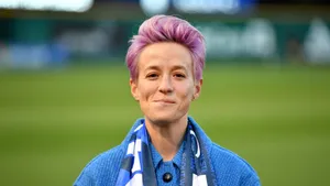 Megan Rapinoe Purple Hair Smile Wallpaper