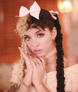 Melanie Martinez In Peach Wallpaper