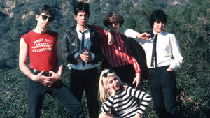 Members Of The Celebrated American Rock Band Blondie Posing During A Group Film Photo Shoot Wallpaper