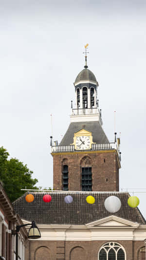 Meppel Clock Towerwith Colorful Balloons Wallpaper