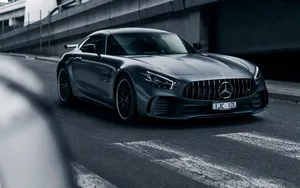 Mercedes Amg 4k Car On Pedestrian Crossing Wallpaper