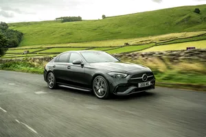 Mercedes Benz C Class Driving Countryside Wallpaper