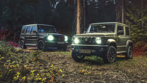 Mercedes G63and Suzuki Jimny Twilight Forest Wallpaper