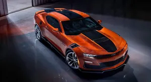 Mesmerizing Black And Orange Abstract Background Wallpaper