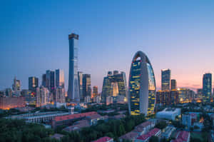 Mesmerizing City Skyline At Dusk Wallpaper