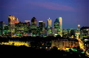 Mesmerizing Downtown Dallas Skyline At Night Wallpaper
