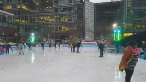 Mesmerizing Ice Rink Under Twinkling Lights Wallpaper