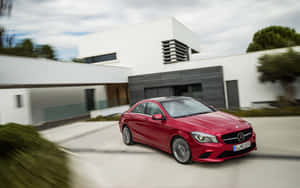 Mesmerizing Mercedes Benz Cla-class On Open Road Wallpaper