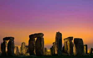 Mesmerizing Sunset At The Historical Stonehenge Wallpaper