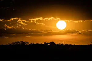 Mesmerizing Sunset Hues At The Beach Wallpaper