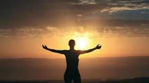 Mesmerizing Waves Breaking On A Rocky Beach Wallpaper