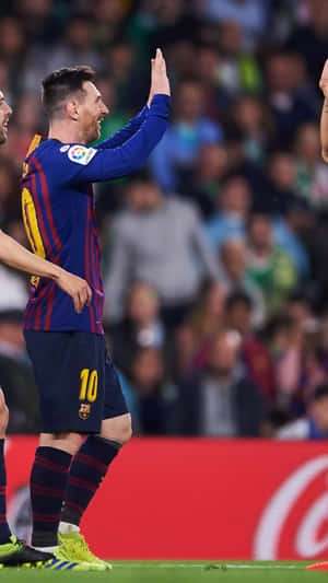 Messi Celebratingon Field Wallpaper