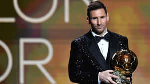 Messi Winning Ballon Dor Wallpaper