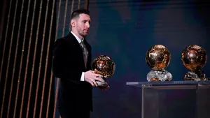 Messi With Golden Balls Wallpaper