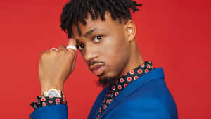 Metro Boomin Stylish Portrait Red Background Wallpaper