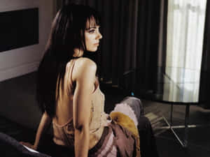 Mia_ Kirshner_ Elegant_ Pose Wallpaper