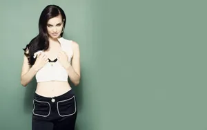 Mia Kirshner Playful Pose Wallpaper