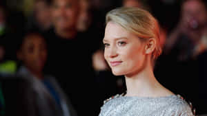 Mia Wasikowska Smiling Radiantly Wallpaper