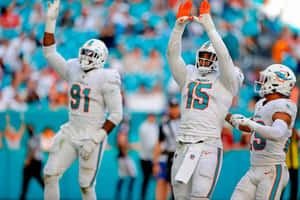 Miami Dolphins Celebrationon Field Wallpaper
