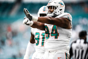Miami Dolphins Defensive Lineman Celebration Wallpaper