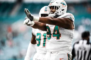Miami Dolphins Defensive Lineman Celebration Wallpaper