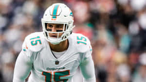 Miami Dolphins Player Focused On Field Wallpaper