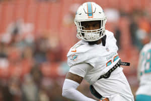 Miami Dolphins Player In Action.jpg Wallpaper