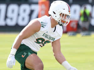 Miami Hurricanes Football Player Action Shot Wallpaper