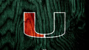 Miami Hurricanes Logo On Wood Wallpaper