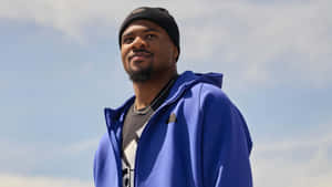 Micah Parsons In Blue Jacket Wallpaper