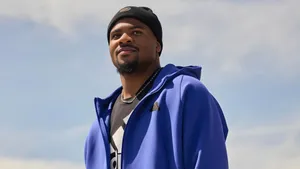 Micah Parsons In Blue Jacket Wallpaper