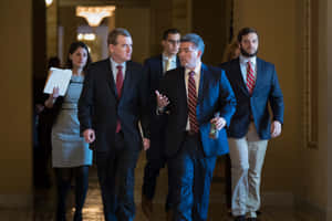 Michael Bennet Listening To Cory Gardner Wallpaper