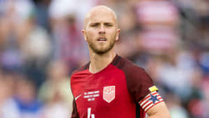 Michael Bradley Runs At The Soccer Field Wallpaper