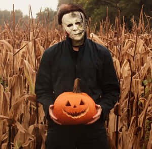 Michael Myers Holding Jack O Lantern Wallpaper